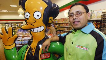 7-Eleven manager D.G. Suthar hangs out with cartoon propriet