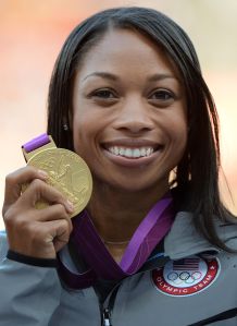 US' gold medalist Allyson Felix poses on