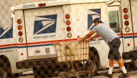 Mail carriers loading their trucks at the United States Postal Service in Van Nuys, California for story on USPS delays