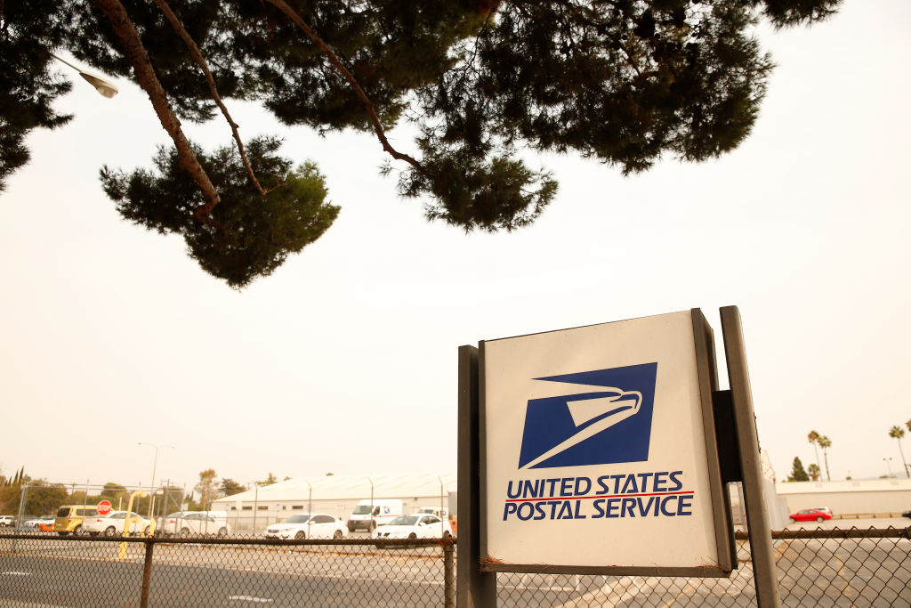 Mail carriers loading their trucks at the United States Postal Service in Van Nuys, California for story on USPS delays