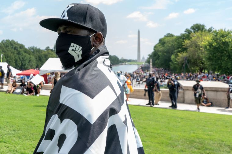 Tens Of Thousands Join ''Get Your Knee Off Our Necks'' March In Washington DC