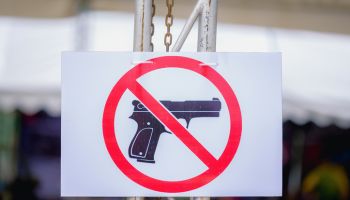 Close-Up Of Gun Free Zone Sign