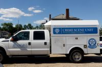 Bureau of Criminal Investigations truck is parked at the...