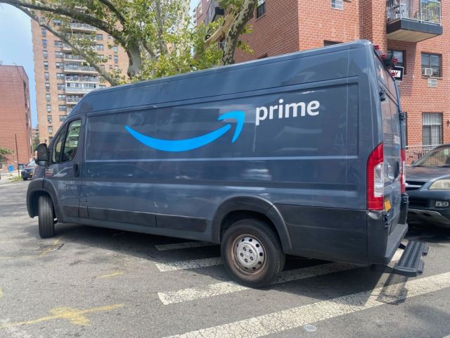 Amazon Prime van parked by residential buildings, Queens, New York