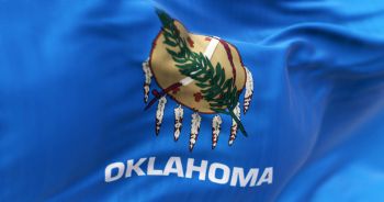 Close up view of the Oklahoma state flag waving