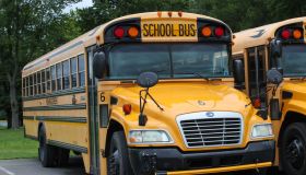 School buses are seen parked at Bloomsburg High School as...