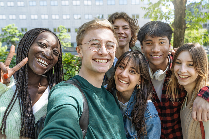 Multicultural Teenagers Taking a Selfie at School Park