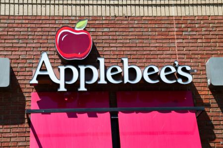 An Applebee's logo is seen outside their casual dining...