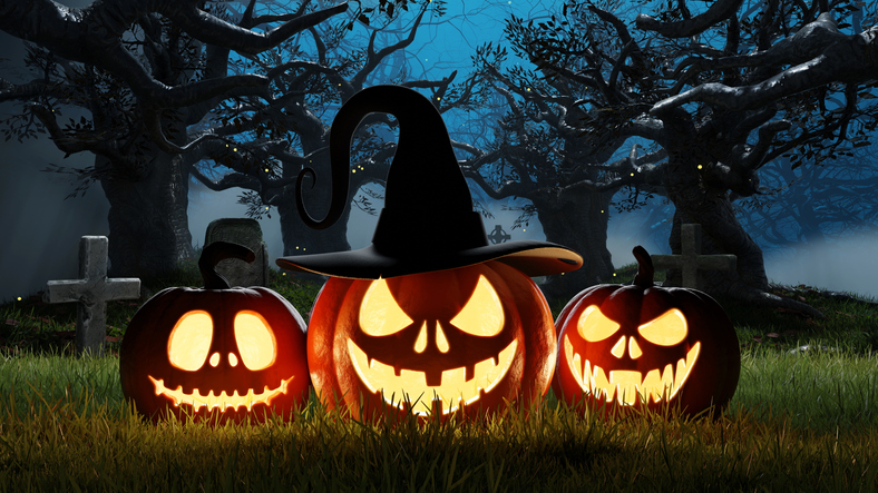 Halloween Three glowing pumpkins in the cemetery at night near the graves. 3d render