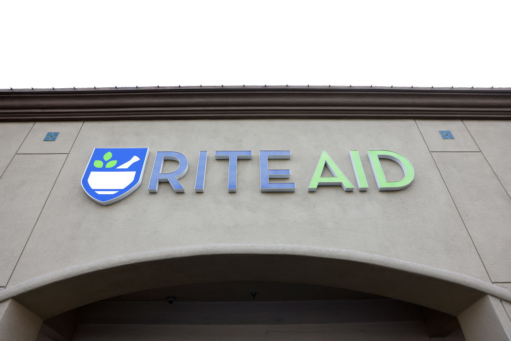Pharmacy chain Rite Aid said Sunday that it has filed for bankruptcy and obtained $3.45 billion in fresh financing as it carries out a restructuring plan while coping with falling sales and opioid-related lawsuits.