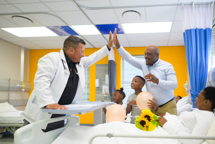 Suprise hospital visit high five