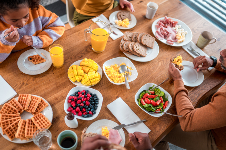 Diverse Family Enjoying Multigenerational Brunch Together