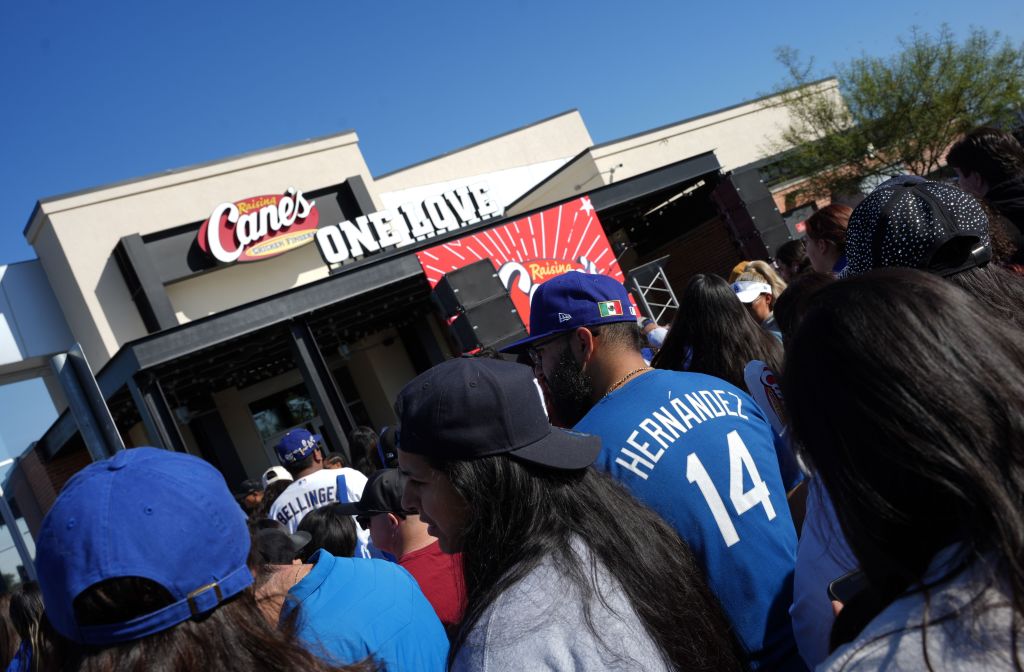 LA Dodgers Star Kike Hernández Works Celebratory World Series "Shift" at Raising Cane's in Los Angeles